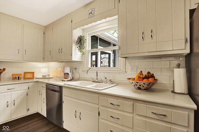 12669 Brookshire Pkwy, Carmel, IN 46033 - kitchen featuring light countertops, decorative backsplash, a sink, and dishwasher