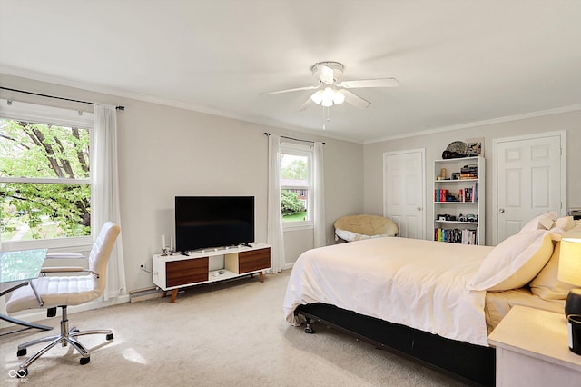 12669 Brookshire Pkwy, Carmel, IN 46033 - bedroom featuring crown molding, baseboards, light carpet, and a ceiling fan
