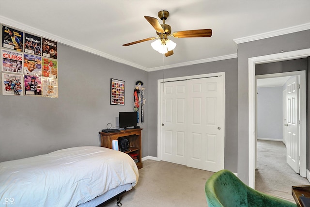 12669 Brookshire Pkwy, Carmel, IN 46033 - carpeted bedroom featuring crown molding, baseboards, and a closet