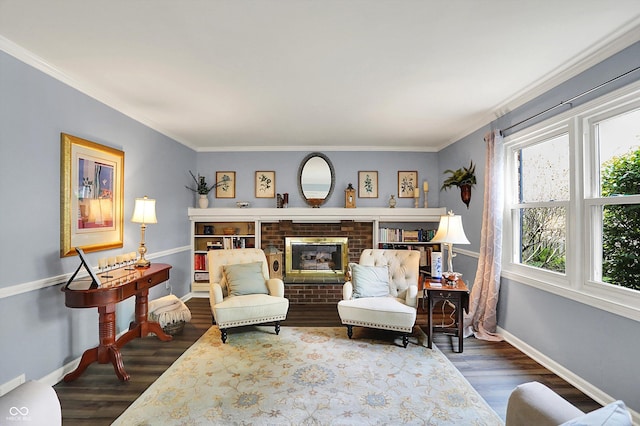 12669 Brookshire Pkwy, Carmel, IN 46033 - living area with crown molding, baseboards, a brick fireplace, and wood finished floors