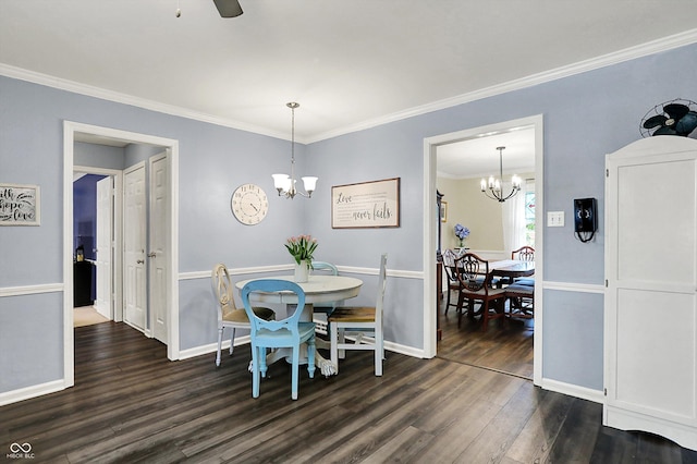 12669 Brookshire Pkwy, Carmel, IN 46033 - dining room with crown molding, baseboards, ceiling fan with notable chandelier, and dark wood finished floors