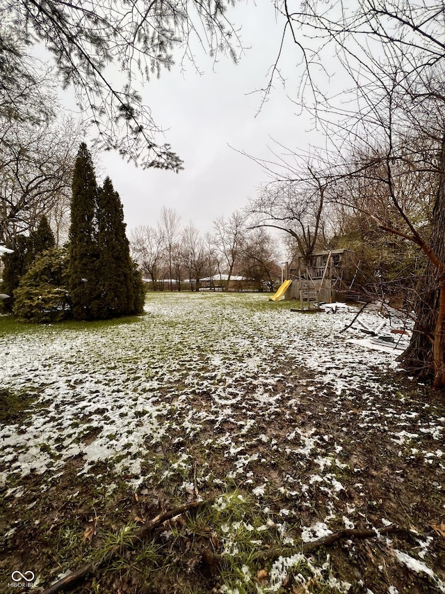 view of yard with a playground