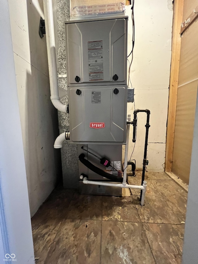 utility room with heating unit