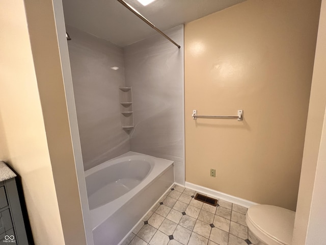 bathroom featuring toilet, tub / shower combination, tile patterned floors, visible vents, and baseboards
