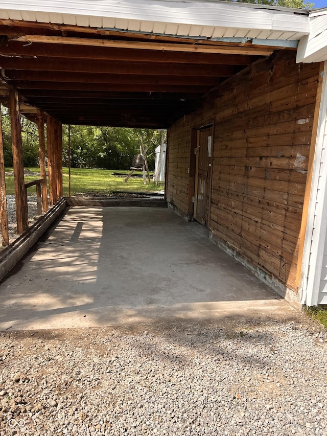 view of parking with a carport