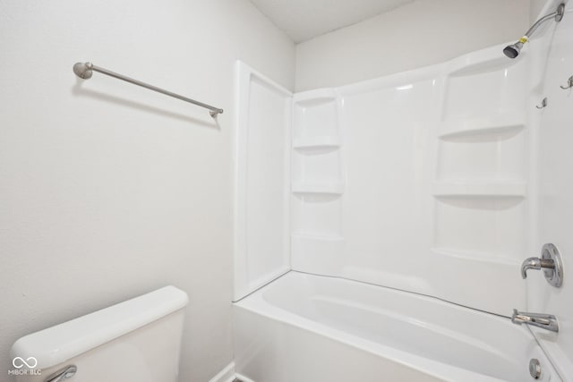 full bath with washtub / shower combination and toilet