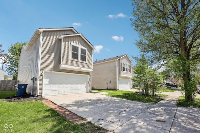 view of front of home with fence, driveway, a front lawn, and a garage