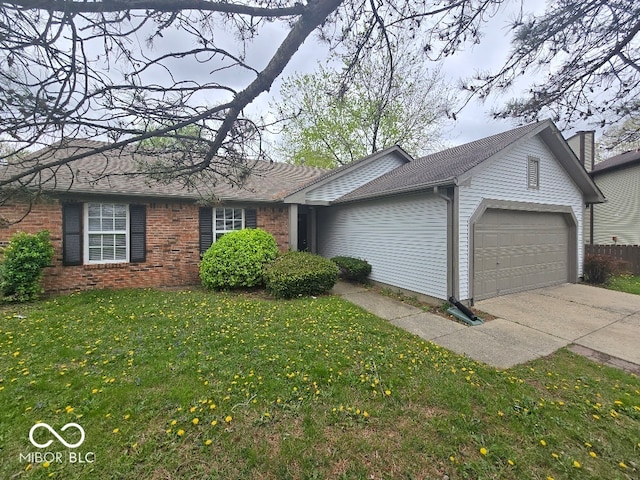 9118 Lansburgh Ct, Indianapolis, IN 46234 - ranch-style home featuring a garage, brick siding, a front yard, and driveway