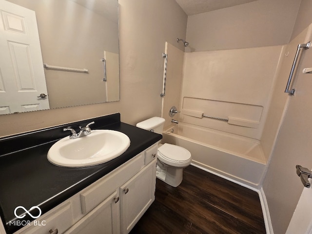 9118 Lansburgh Ct, Indianapolis, IN 46234 - bathroom with vanity, wood finished floors, shower / tub combination, and toilet