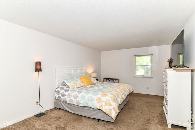 7140 Avalon Trail Dr, Indianapolis, IN 46250 - bedroom featuring light colored carpet and baseboards