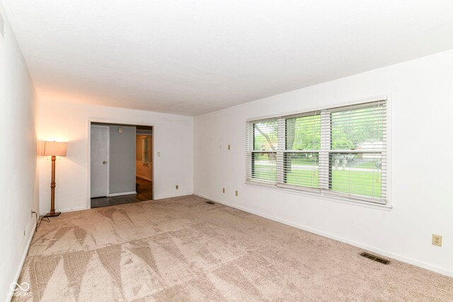 7140 Avalon Trail Dr, Indianapolis, IN 46250 - carpeted empty room with baseboards