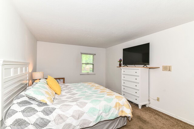 7140 Avalon Trail Dr, Indianapolis, IN 46250 - carpeted bedroom with baseboards