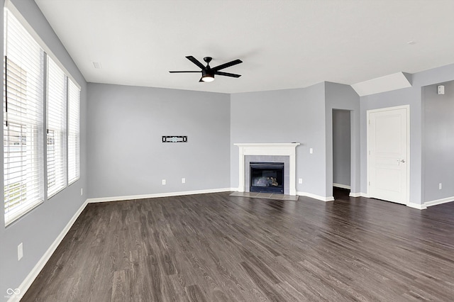 6827 Fallen Leaf Dr, Whitestown, IN 46075 - unfurnished living room with a ceiling fan, healthy amount of natural light, and dark wood-type flooring