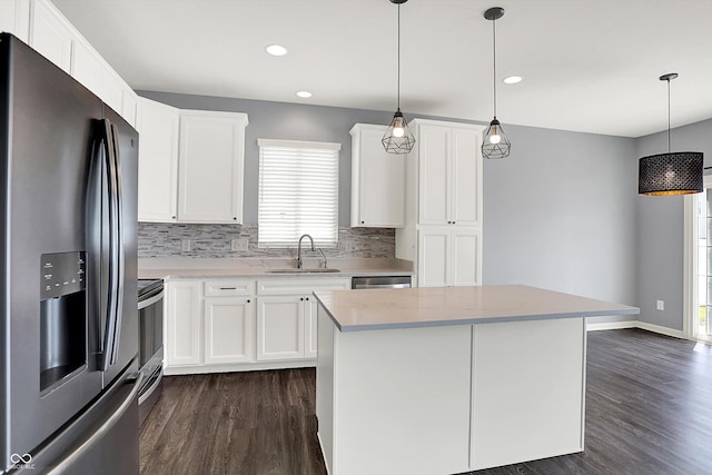 6827 Fallen Leaf Dr, Whitestown, IN 46075 - kitchen with stainless steel appliances, dark wood-type flooring, tasteful backsplash, white cabinetry, and recessed lighting