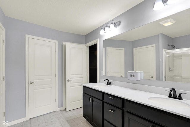 6827 Fallen Leaf Dr, Whitestown, IN 46075 - bathroom featuring double vanity and a shower