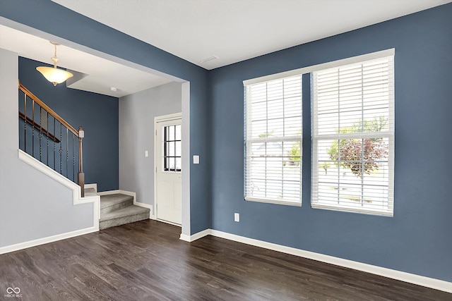 6827 Fallen Leaf Dr, Whitestown, IN 46075 - foyer featuring stairs and dark wood-style flooring