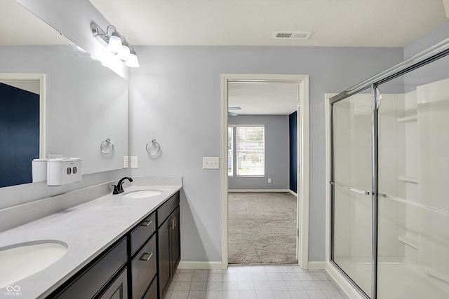 6827 Fallen Leaf Dr, Whitestown, IN 46075 - full bathroom with double vanity, an enclosed shower, and tile patterned flooring