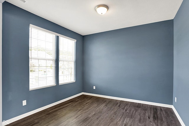 6827 Fallen Leaf Dr, Whitestown, IN 46075 - unfurnished room with healthy amount of natural light and dark wood-style floors
