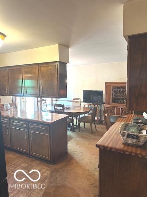 kitchen with dark brown cabinets
