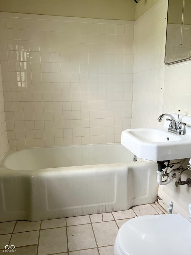 3434 Forrest Ter, Anderson Se, IN 46013 - bathroom with toilet, tile patterned flooring, and tile walls