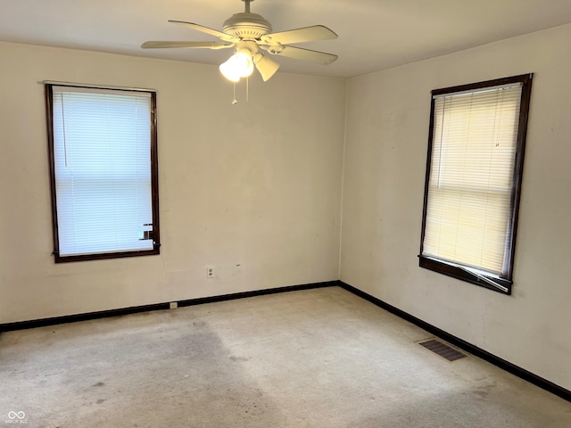 3434 Forrest Ter, Anderson Se, IN 46013 - carpeted empty room with visible vents, a ceiling fan, and baseboards