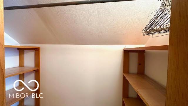 interior space featuring lofted ceiling