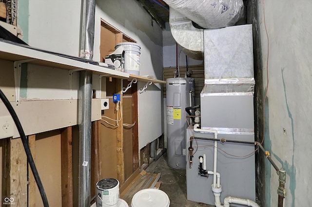 utility room featuring electric water heater