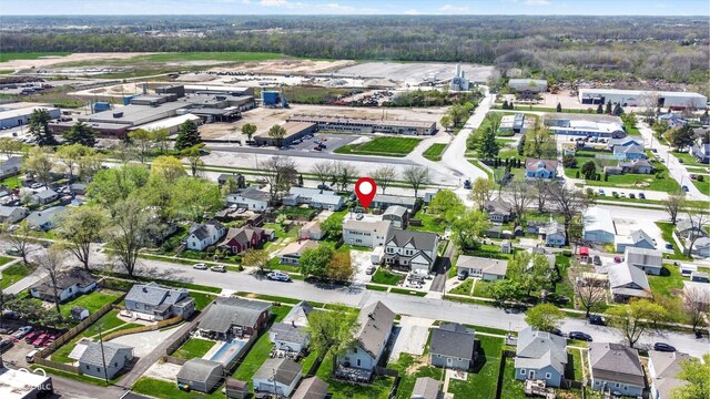 aerial view featuring a residential view and a forest view