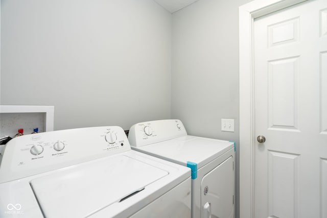 1835 N Rural St, Indianapolis, IN 46218 - washroom with laundry area and independent washer and dryer
