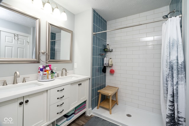 1835 N Rural St, Indianapolis, IN 46218 - full bath with a tile shower, double vanity, and a sink