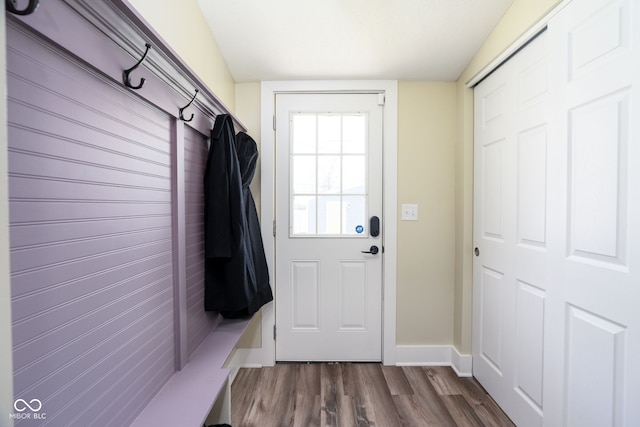 1835 N Rural St, Indianapolis, IN 46218 - mudroom with dark wood-type flooring and baseboards