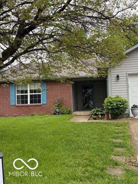 1102 Branifield Ct, Franklin, IN 46131 - doorway to property featuring brick siding and a lawn