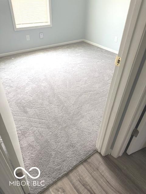 1102 Branifield Ct, Franklin, IN 46131 - spare room with carpet flooring and baseboards