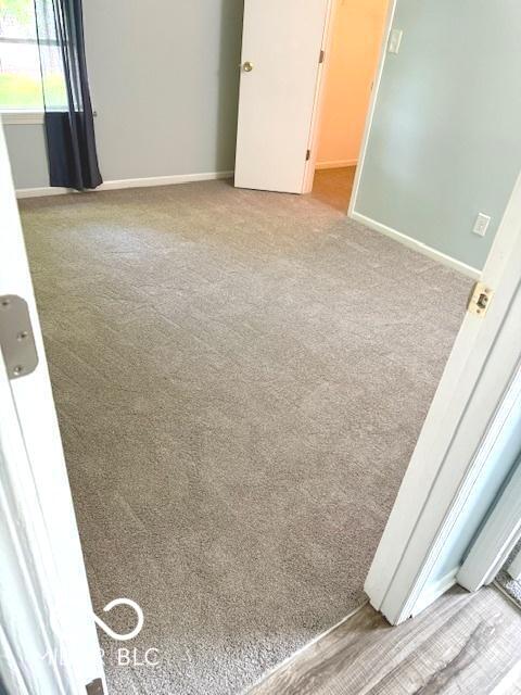 1102 Branifield Ct, Franklin, IN 46131 - carpeted spare room featuring baseboards