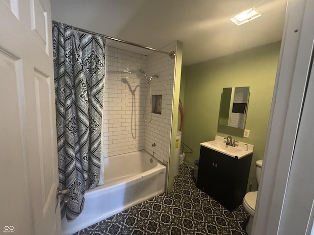 bathroom featuring vanity, shower / tub combo with curtain, and toilet