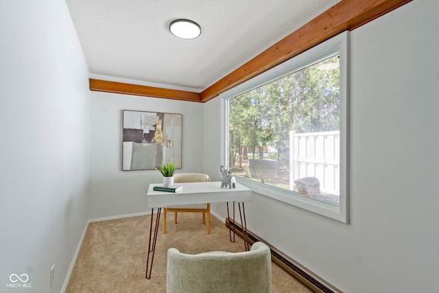 carpeted office featuring baseboards