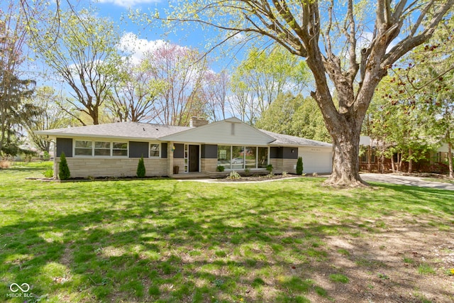 single story home with a front lawn, a sunroom, stone siding, a chimney, and fence
