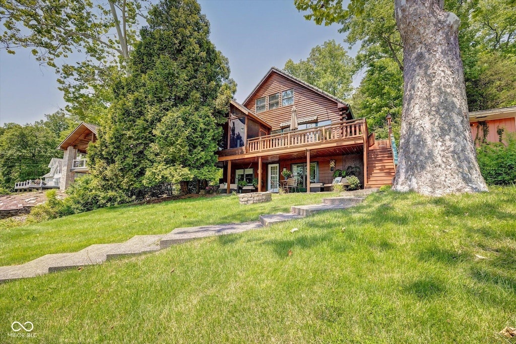 8015 N Lakeview Dr, Unionville, IN 47468 - back of property featuring a deck, stairs, and a yard