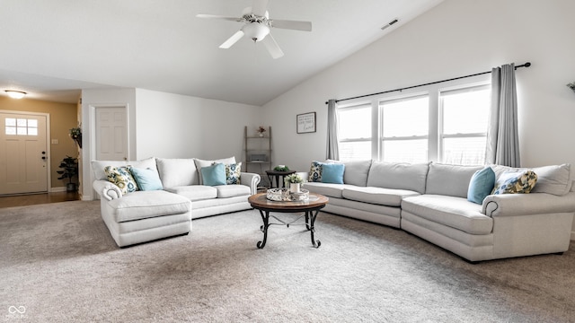 living room with carpet floors, a ceiling fan, visible vents, and vaulted ceiling