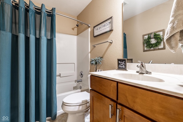 bathroom featuring vanity, tile patterned floors, toilet, a textured wall, and shower / bathtub combination with curtain
