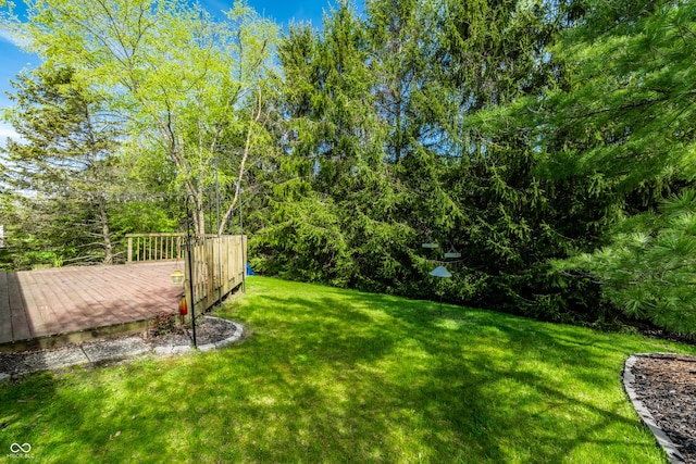 view of yard with a deck