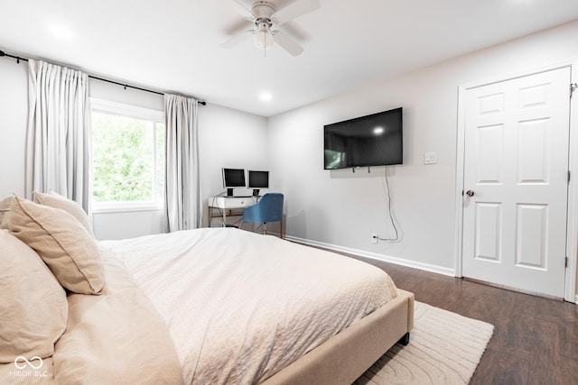 bedroom with dark wood finished floors, recessed lighting, baseboards, and a ceiling fan