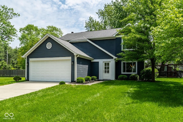 traditional-style house featuring a garage, driveway, and roof with shingles