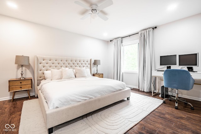 bedroom with wood finished floors, an office area, baseboards, ceiling fan, and recessed lighting