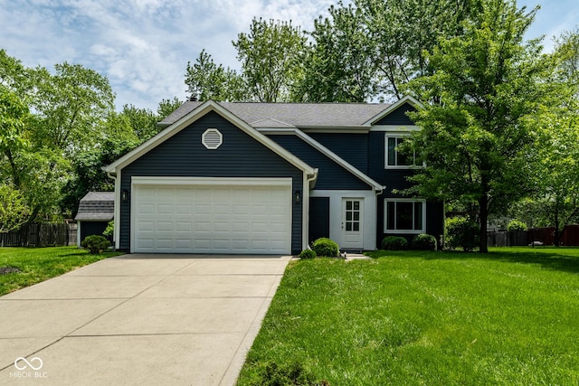 traditional home with an attached garage and concrete driveway