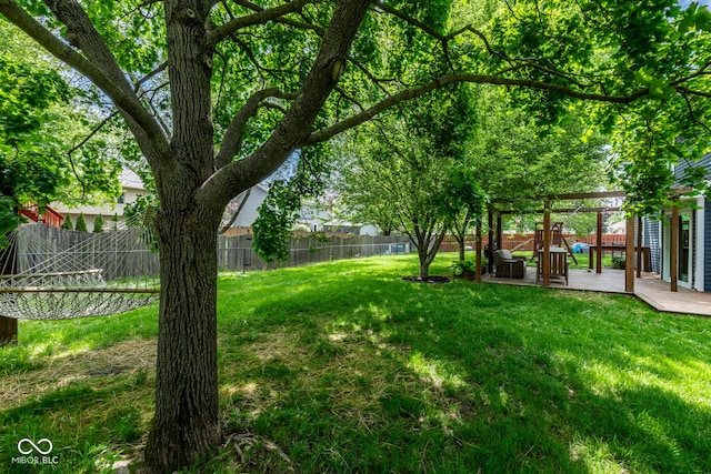 view of yard with a wooden deck