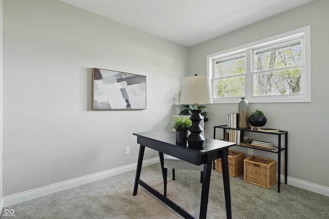 carpeted office with baseboards