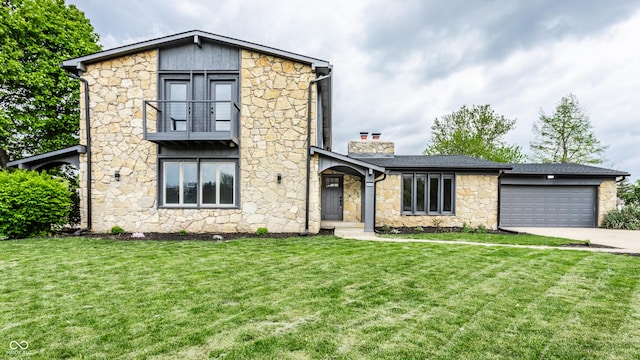 contemporary house featuring stone siding, a garage, a front yard, a chimney, and driveway