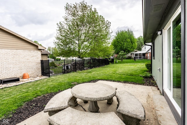 view of yard with a patio area and fence