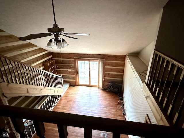 10770 W 650 S, Columbus, IN 47201 - interior space featuring a ceiling fan, wood finished floors, and wooden walls